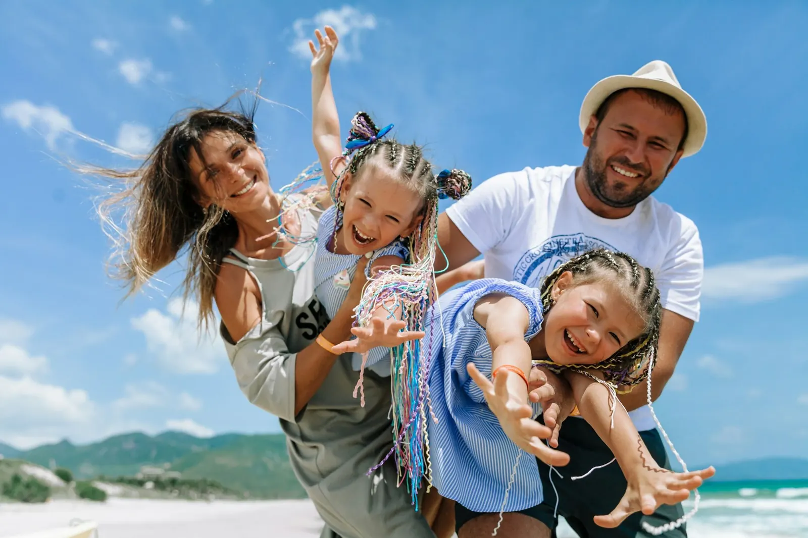 Relocation in Madrid and Valencia: happy family on a sunny day